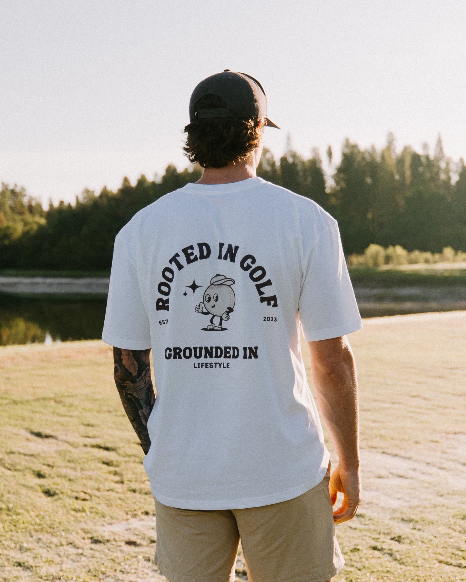 FORE Company modern golf apparel collection, Rooted in Golf graphic tee and signature polos designed by Elle & Reid