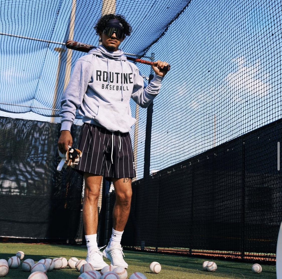 Routine Baseball culture-driven apparel collection, Welcome to the Bigs Spring Collection hoodies, graphic tees, snapback hats, and shorts. Product creation, tech design, and brand strategy by Elle & Reid.